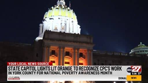 Capitol lights up orange for Poverty Awareness Month